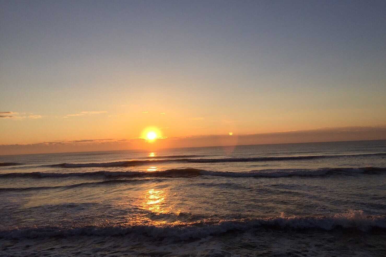 九十九里オートキャンプ場 太陽と海の写真 1枚目