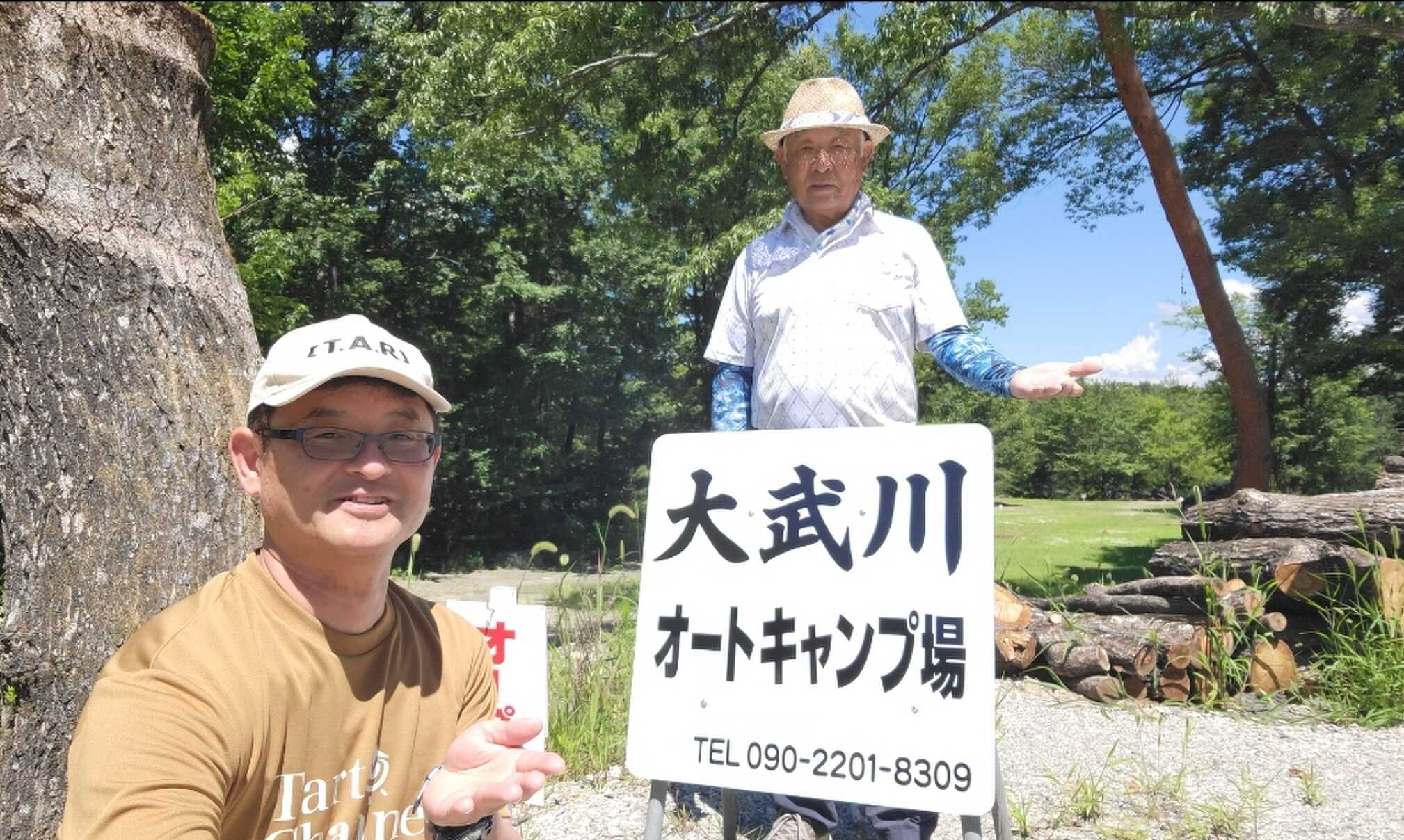 名物管理人の小池さんと。